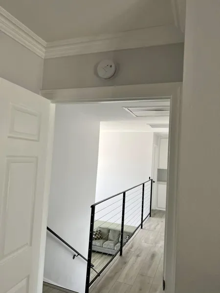 AJM Construction Services project in the Inland Empire: interior hallway trim carpentry and fresh paint